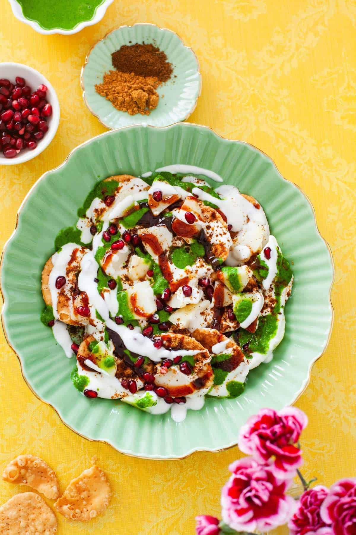 IMG_20481 Papri Chaat with chaat spices, green chutney and pomegranate seeds.