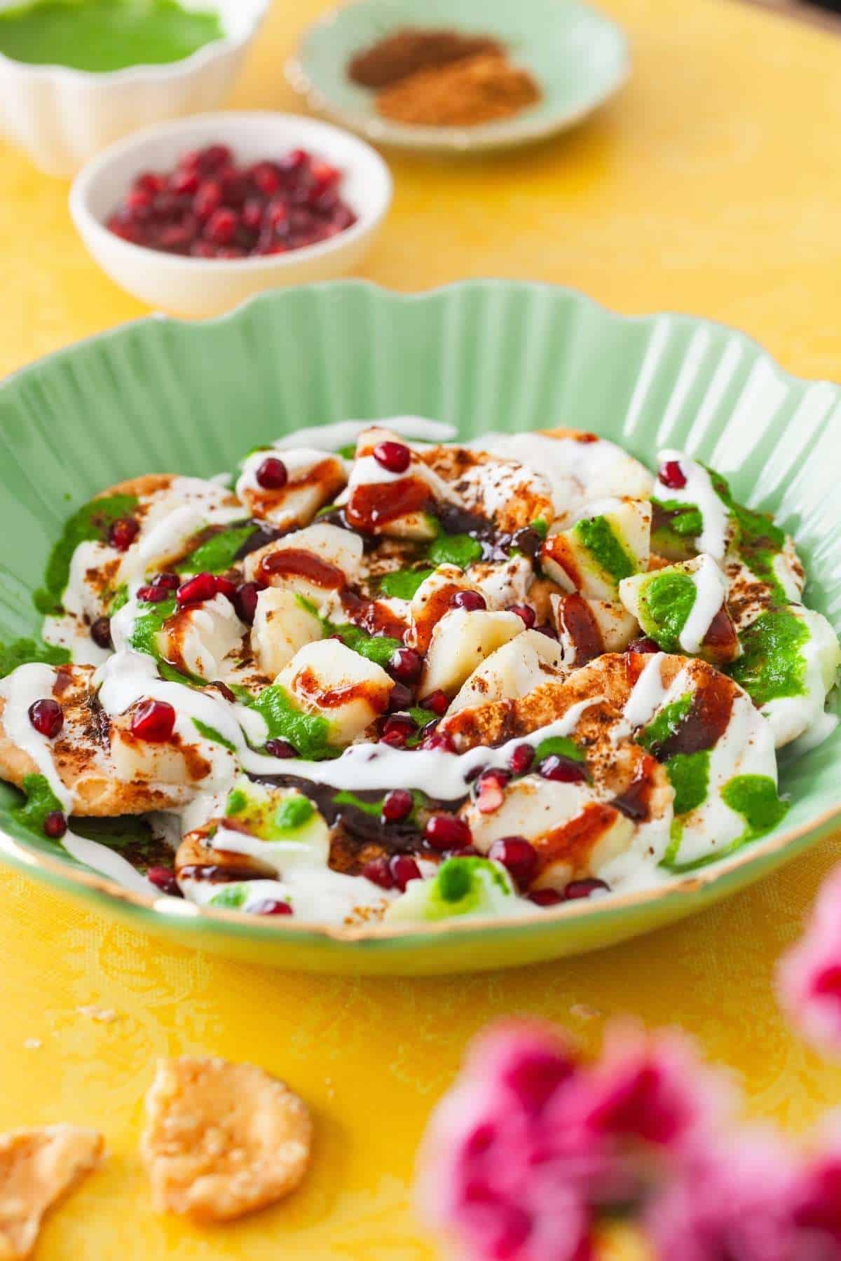 Side view of a plate of papri chaat.