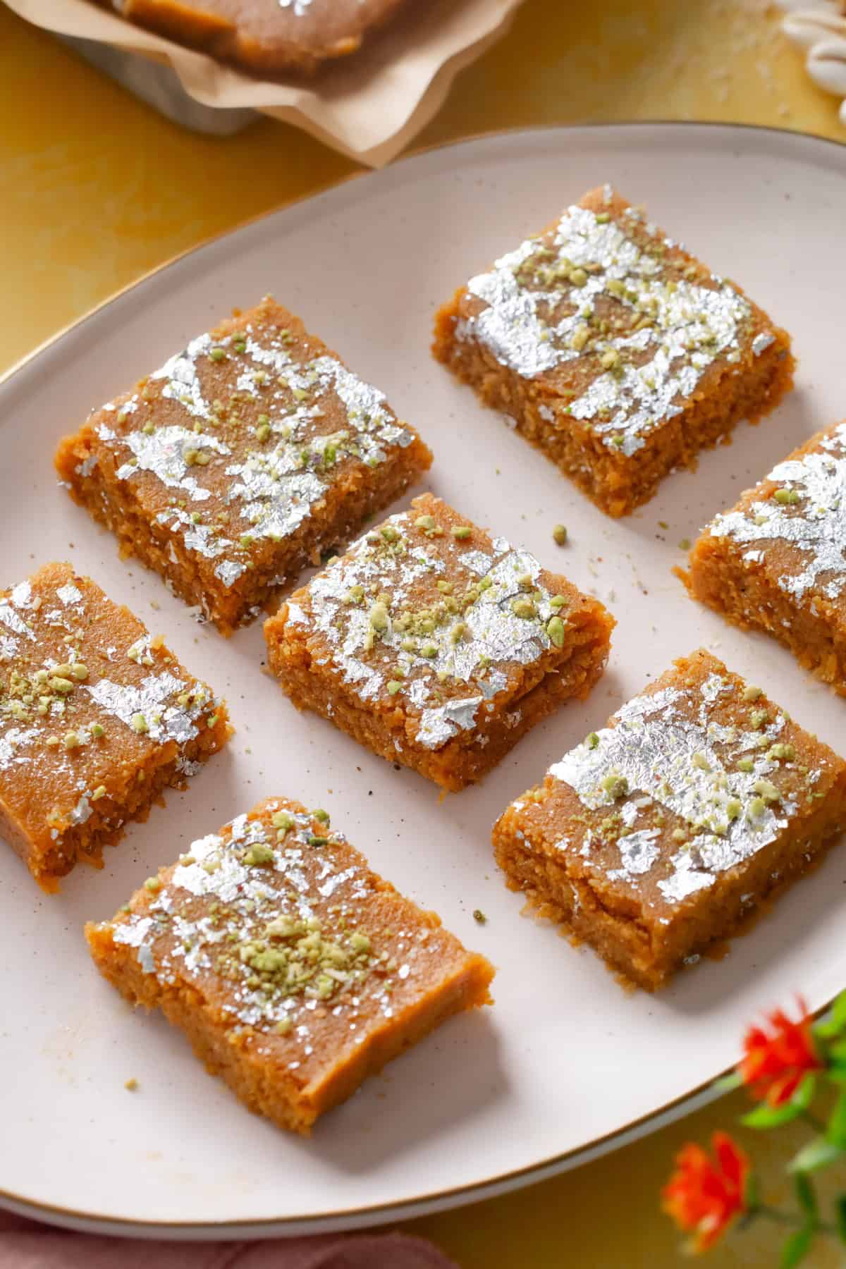 IMG_0500 Closeup of nariyal barfi placed in an oval plate.