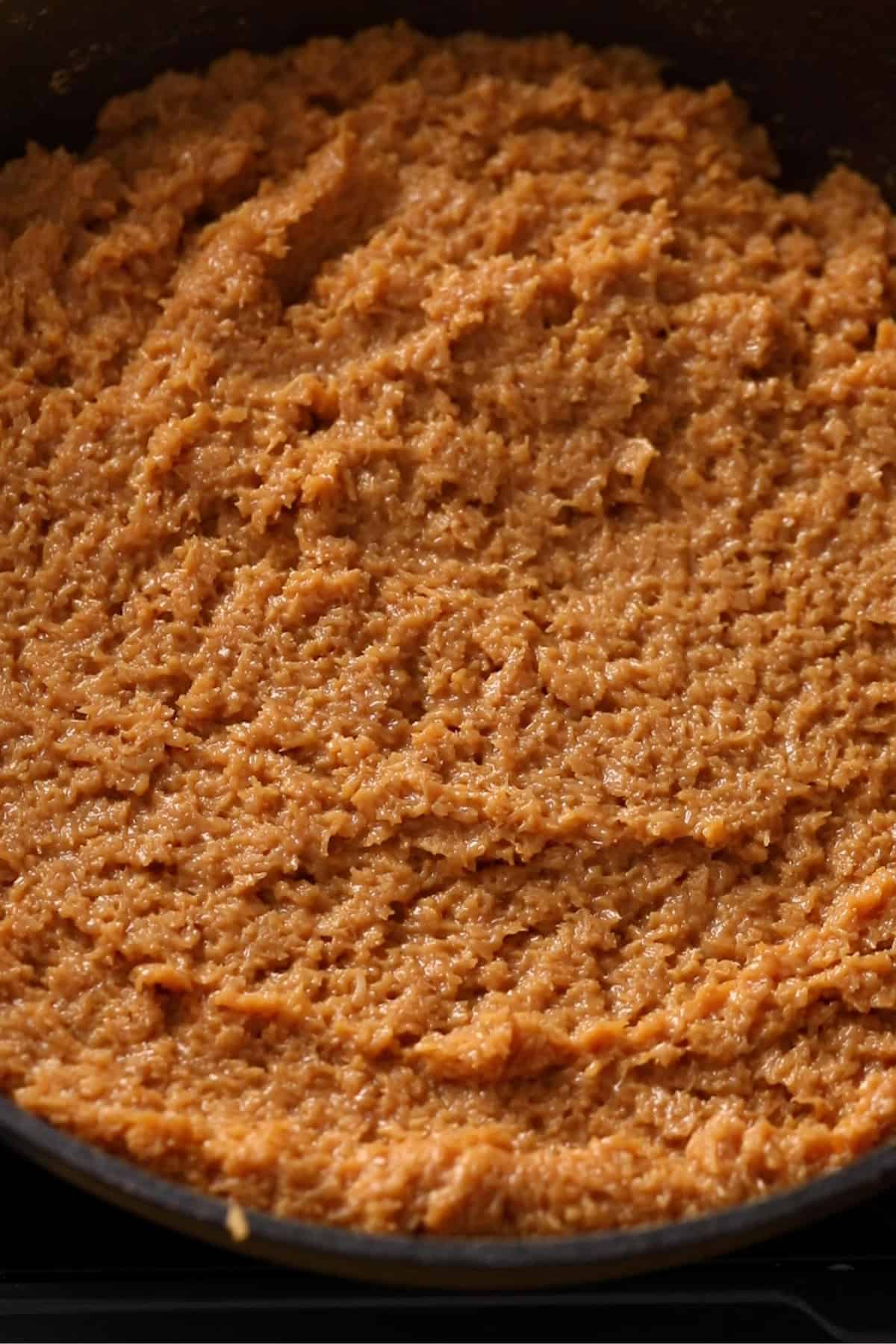 Coconut is covred in dulce de leche.