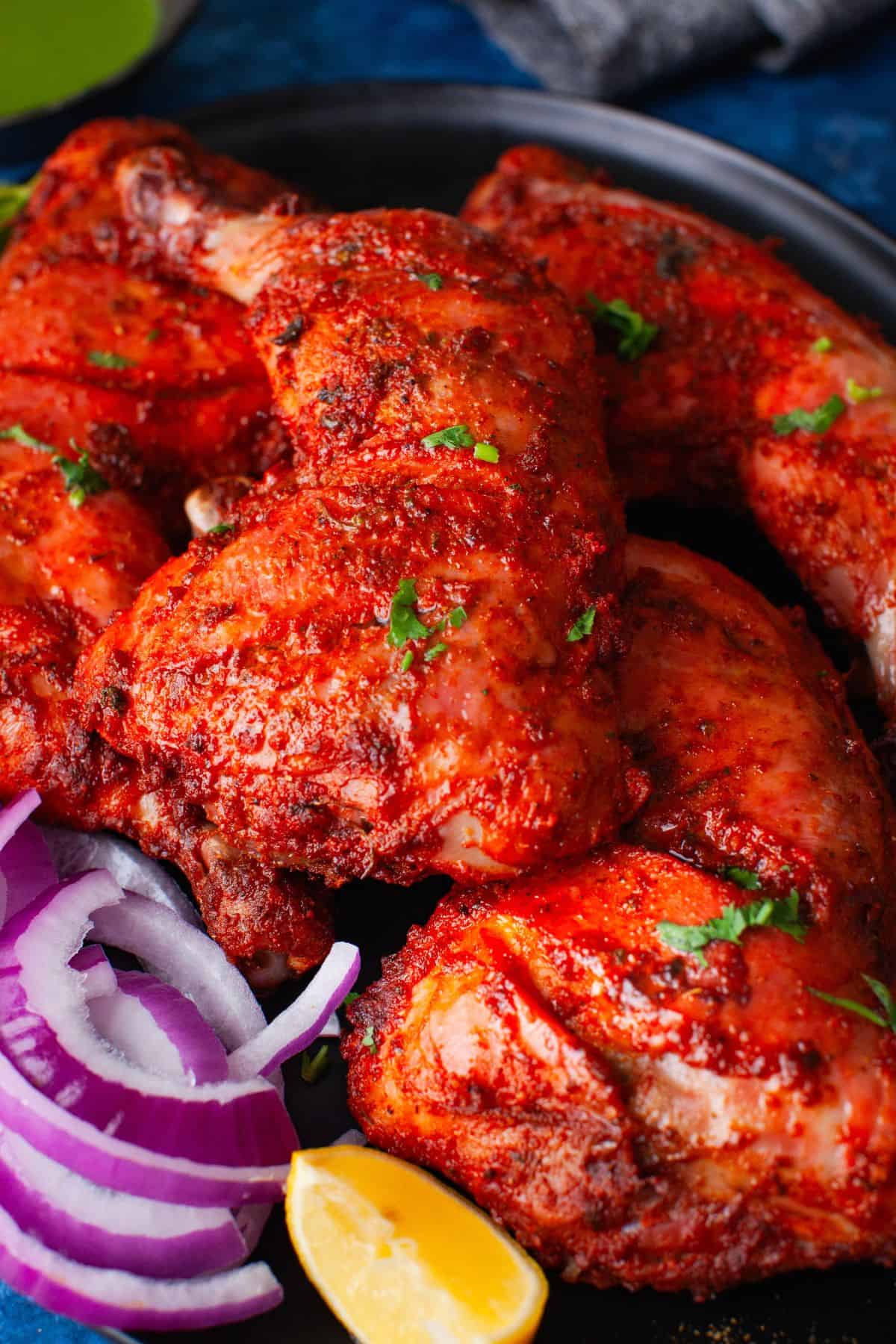 Side view of tandoori chicken.