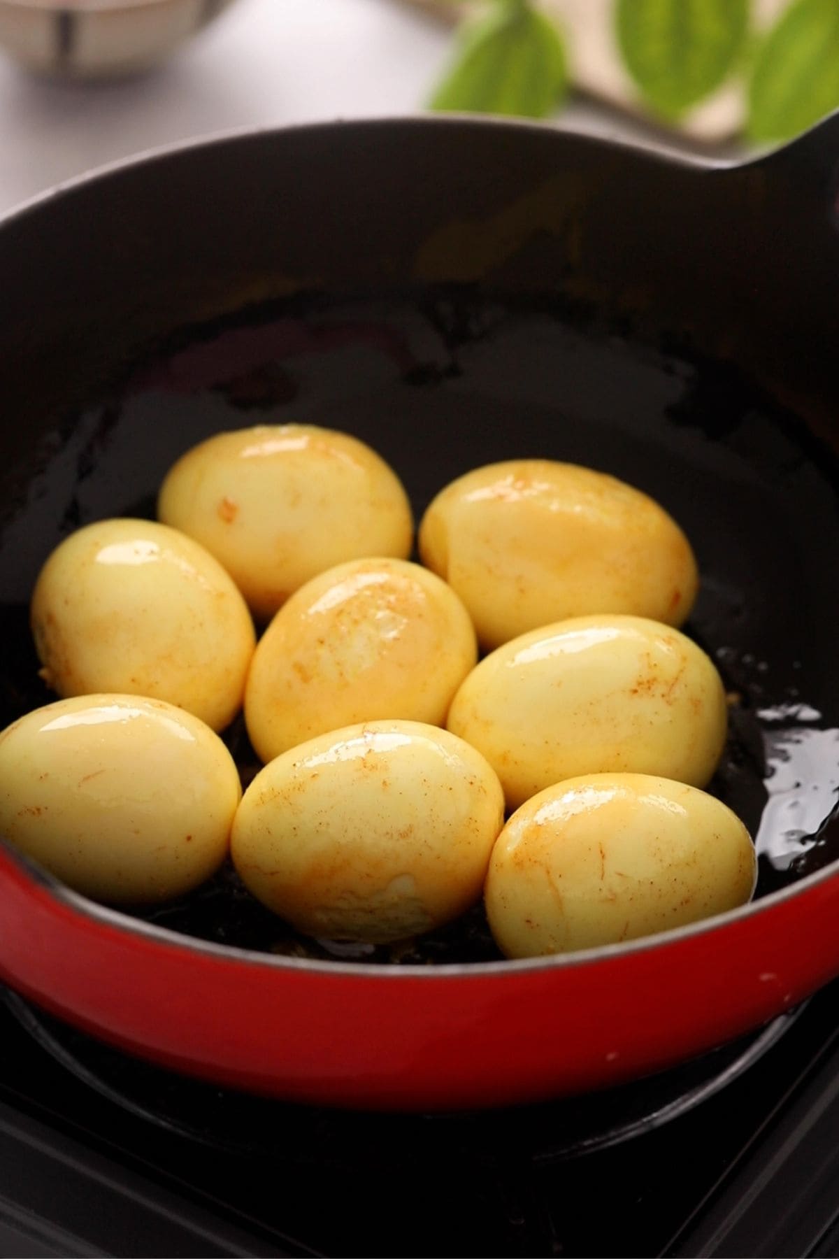 Frying eggs in a cast iron kadal.