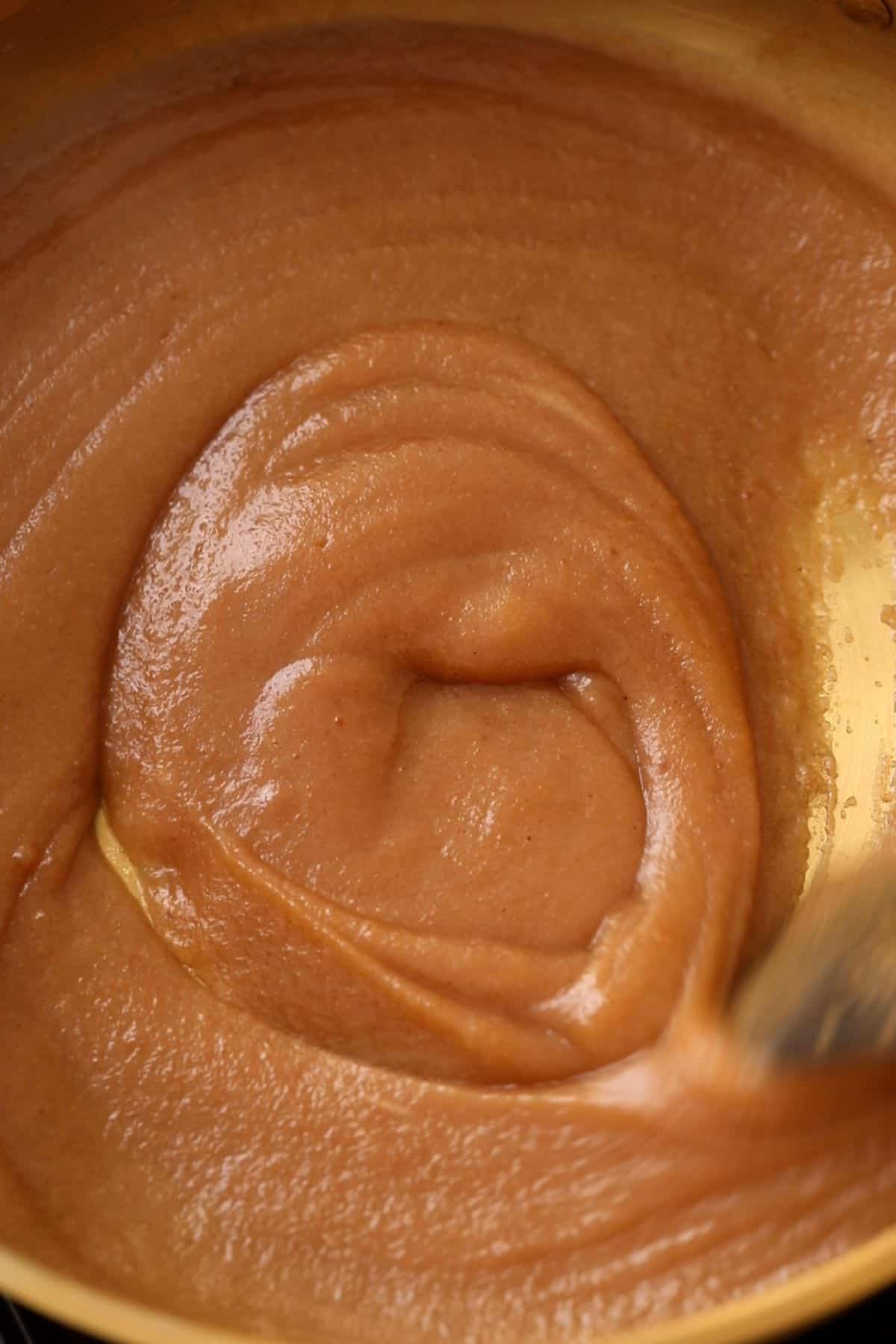 Water is absorbed by the halwa mixture.
