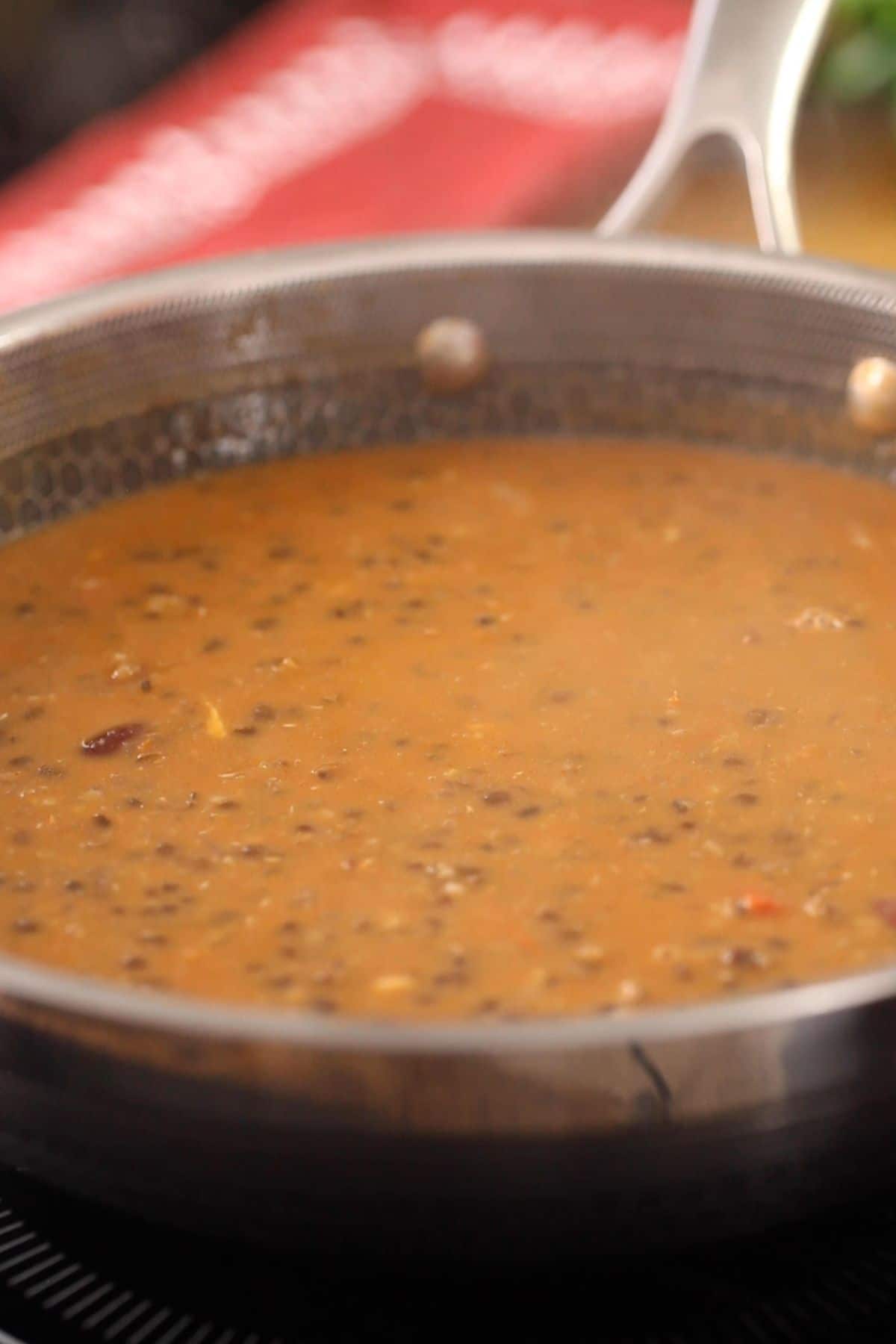 Slow cooking dal makhani on low heat.