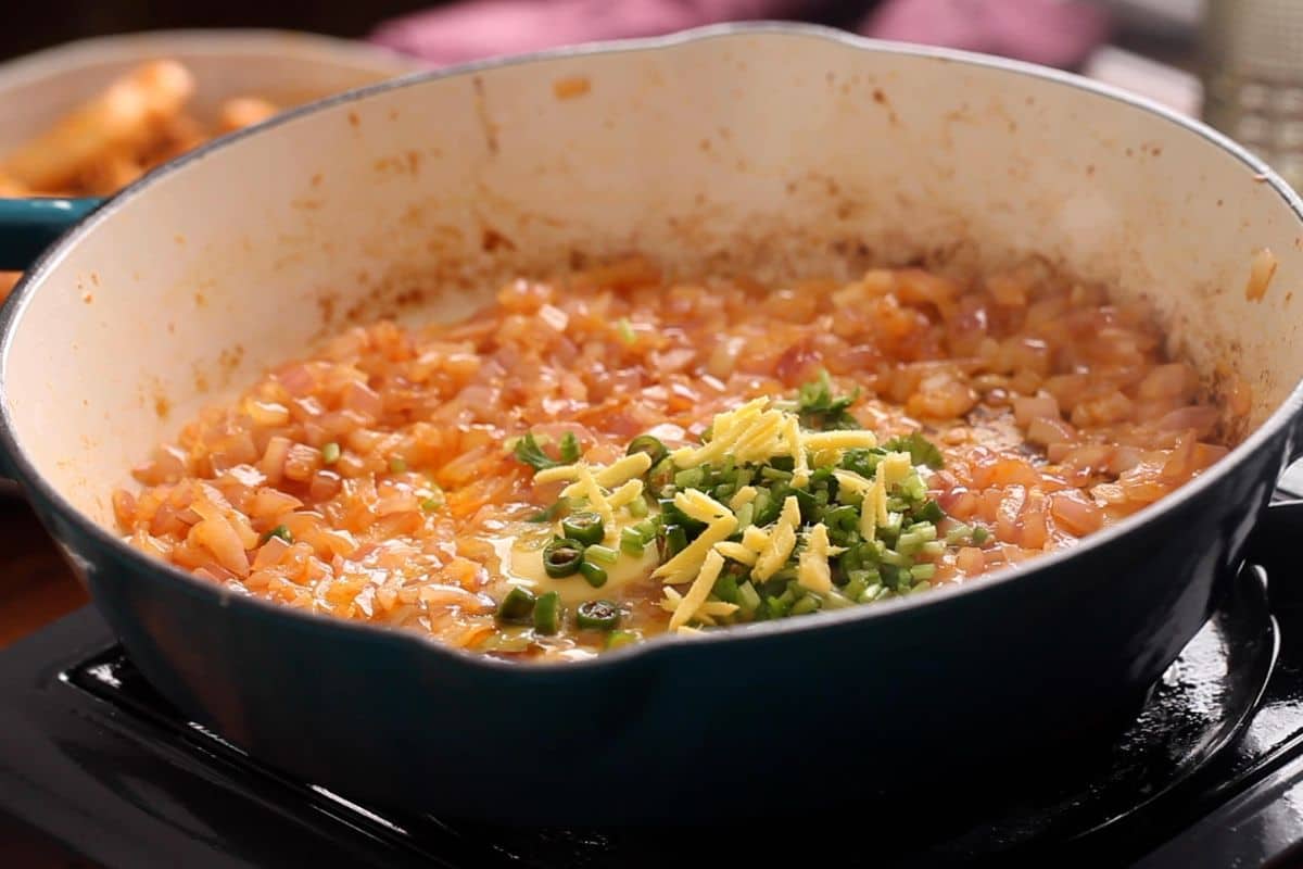 Ginger and green chlies are added next.