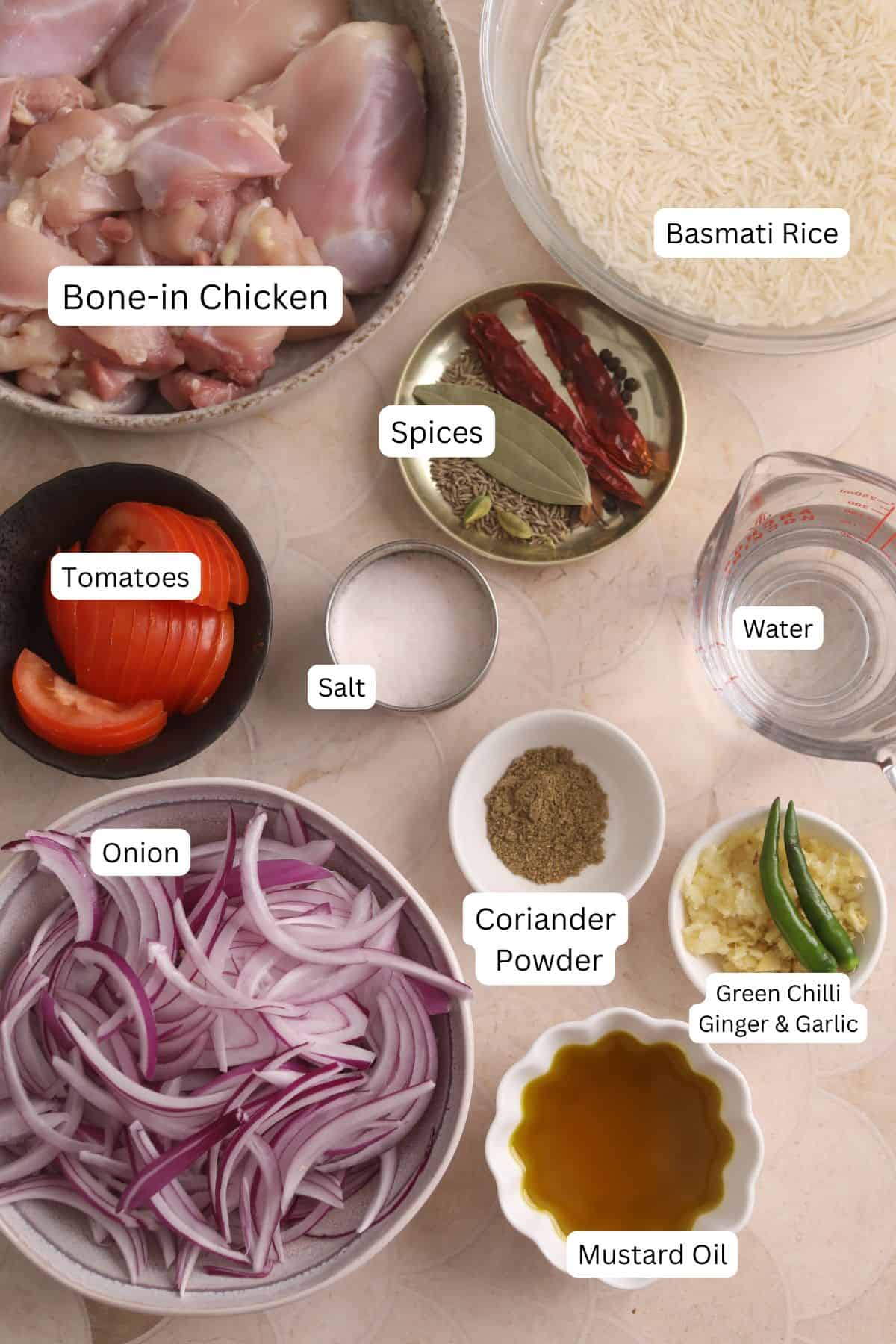 Ingredients for making chicken pulao.