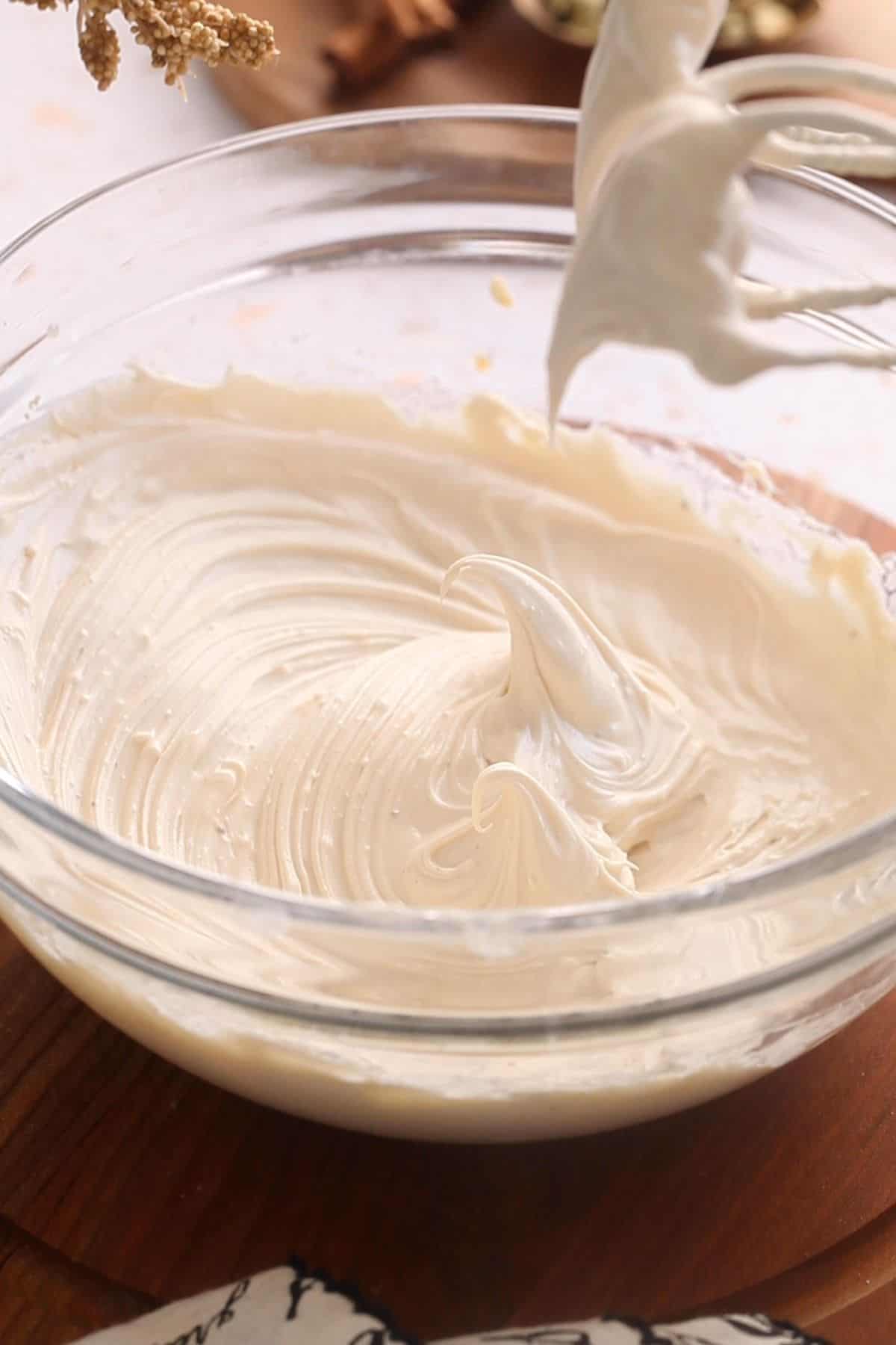 Cream cheese frosting sweetened with brown sugar is ready.