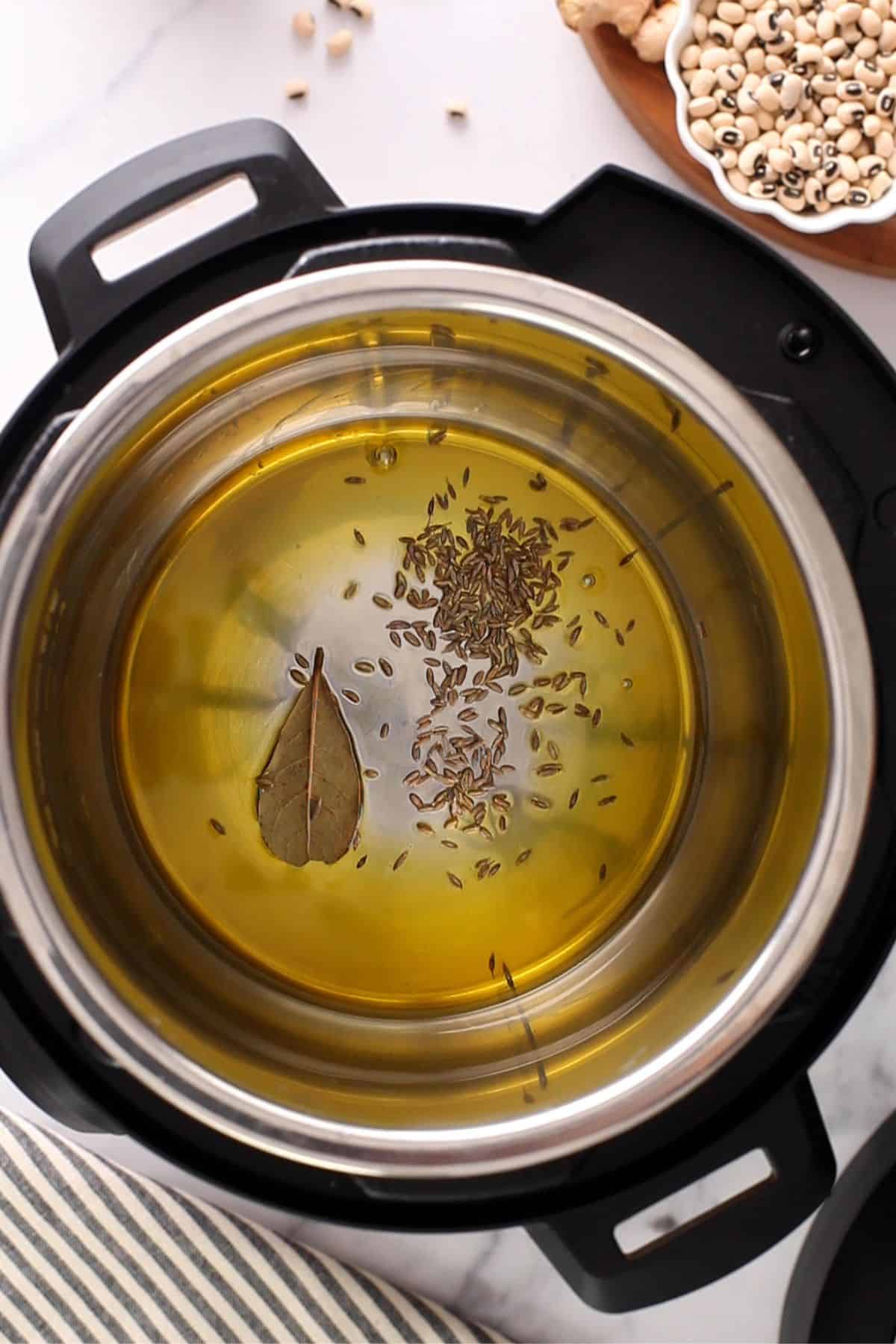 Whole spices cracking in instant pot.