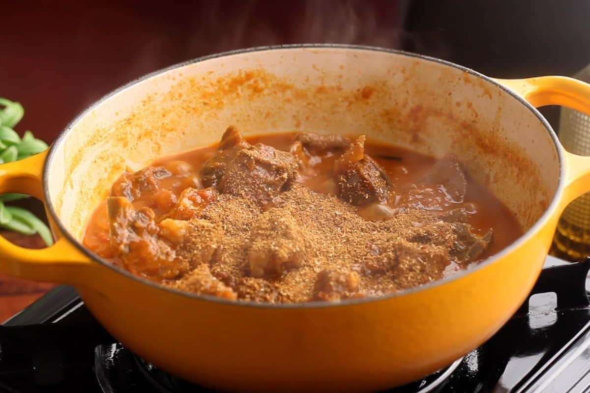 Kadai masala powder is added to the meat.