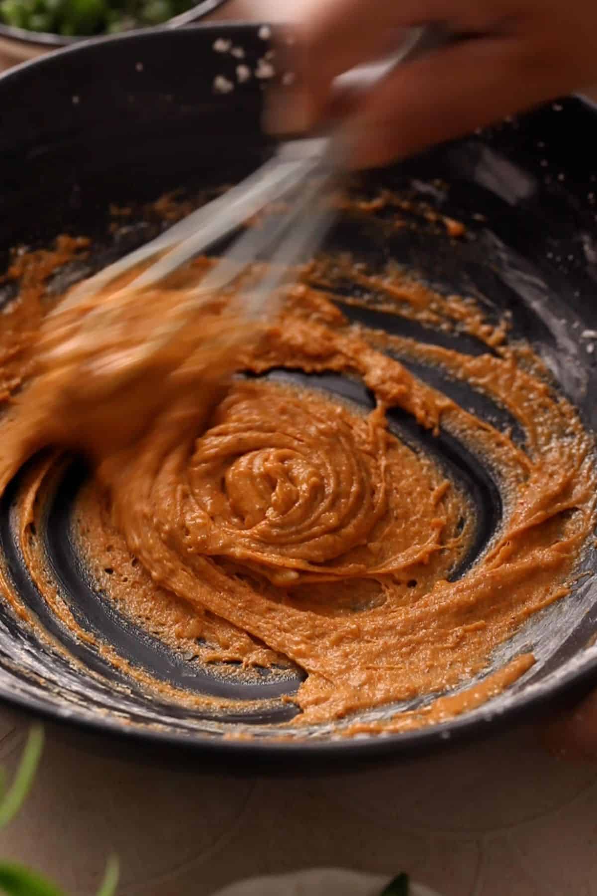 Marinade is being whisked.