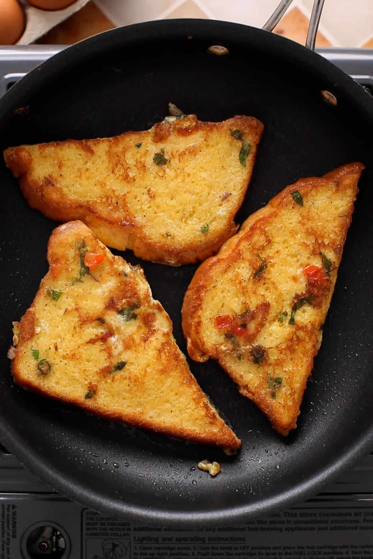 Crispy and golden Indian french toast after pan frying.