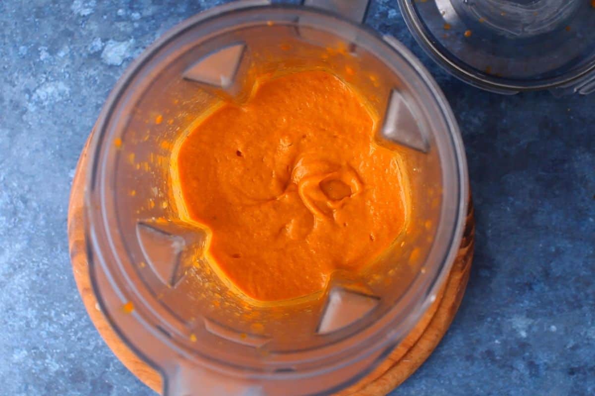 Butter chicken sauce is blended to silky smooth.