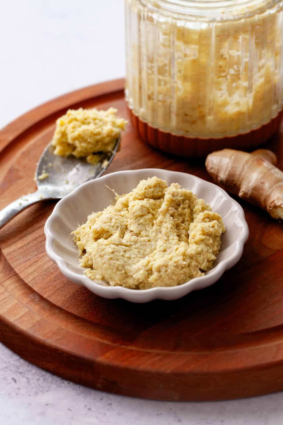 Ginger paste in a white dish.