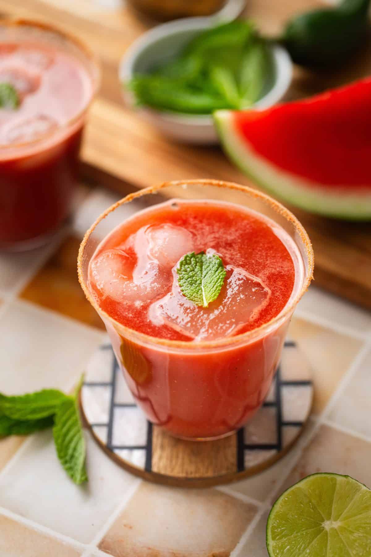 Watermelon jaljeera served in a glass.
