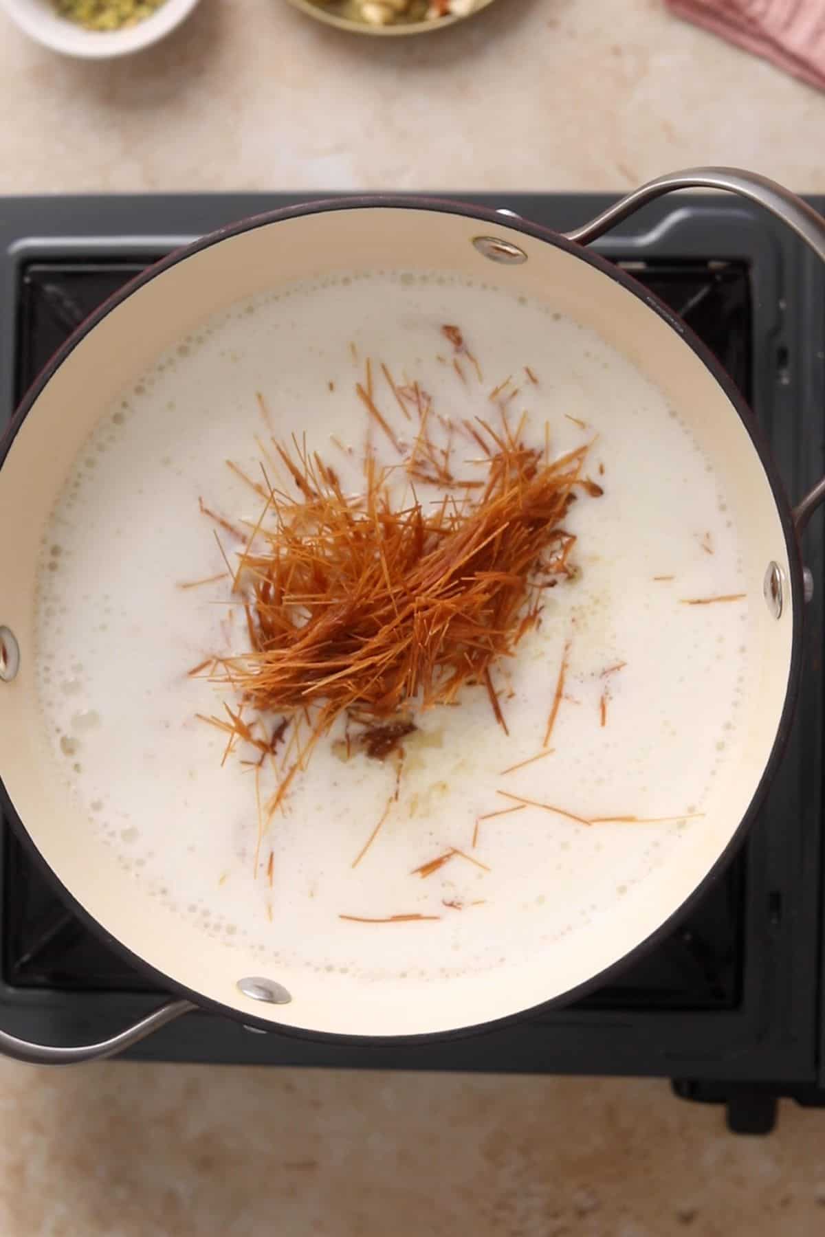 Indian Seviyan Recipe (Creamy Vermicelli Kheer ) 15 Toasted seviyan are added to simmering milk.