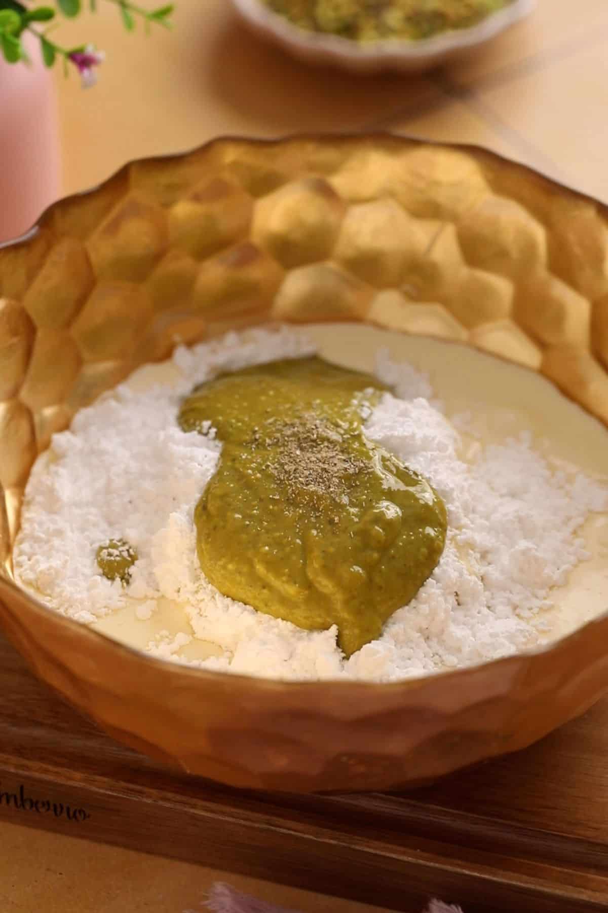 No Bake Pistachio Cheesecake Cups 13 Cheesecake filling ingredients in a golden bowl.