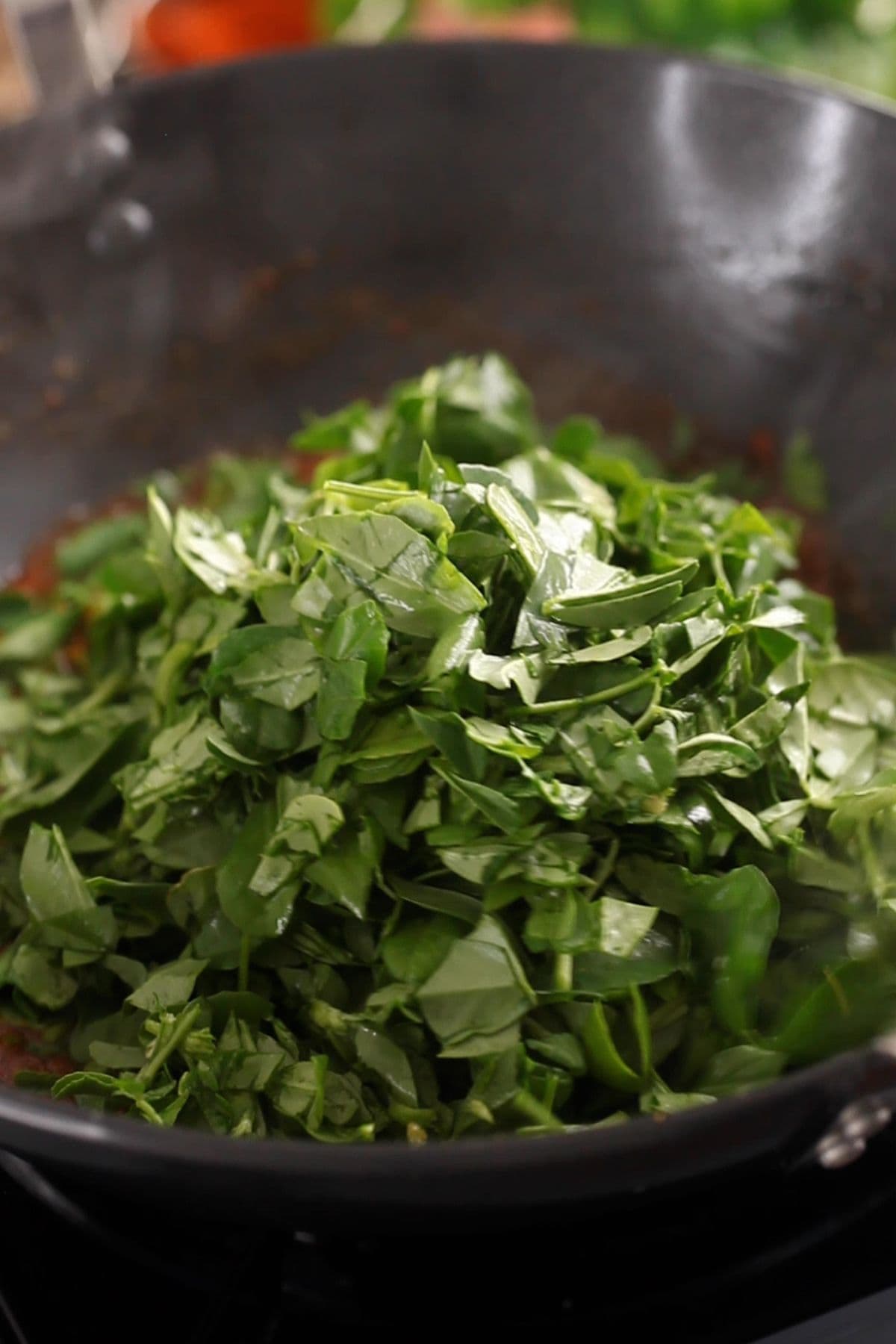 Chopped fresh methi is added to the onion tomato masala. 