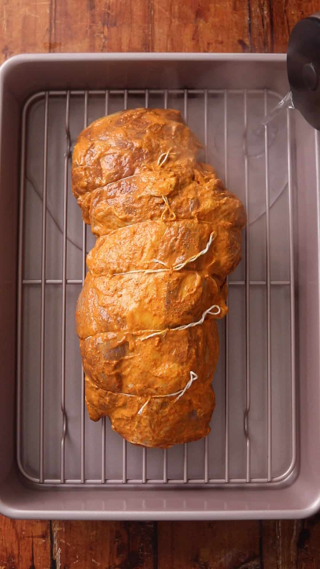 Hot water is added to roasting pan prior to roasting.