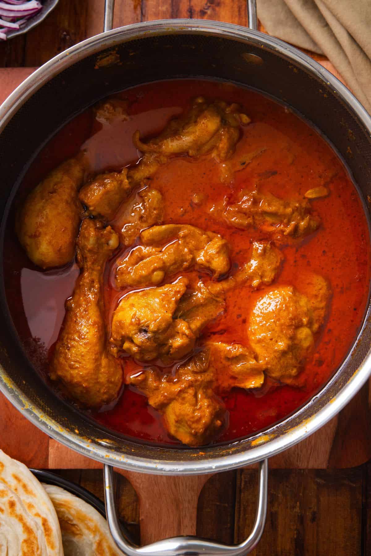 Purani Dilli Chicken korma in a large hybrid steel cooking pot. 