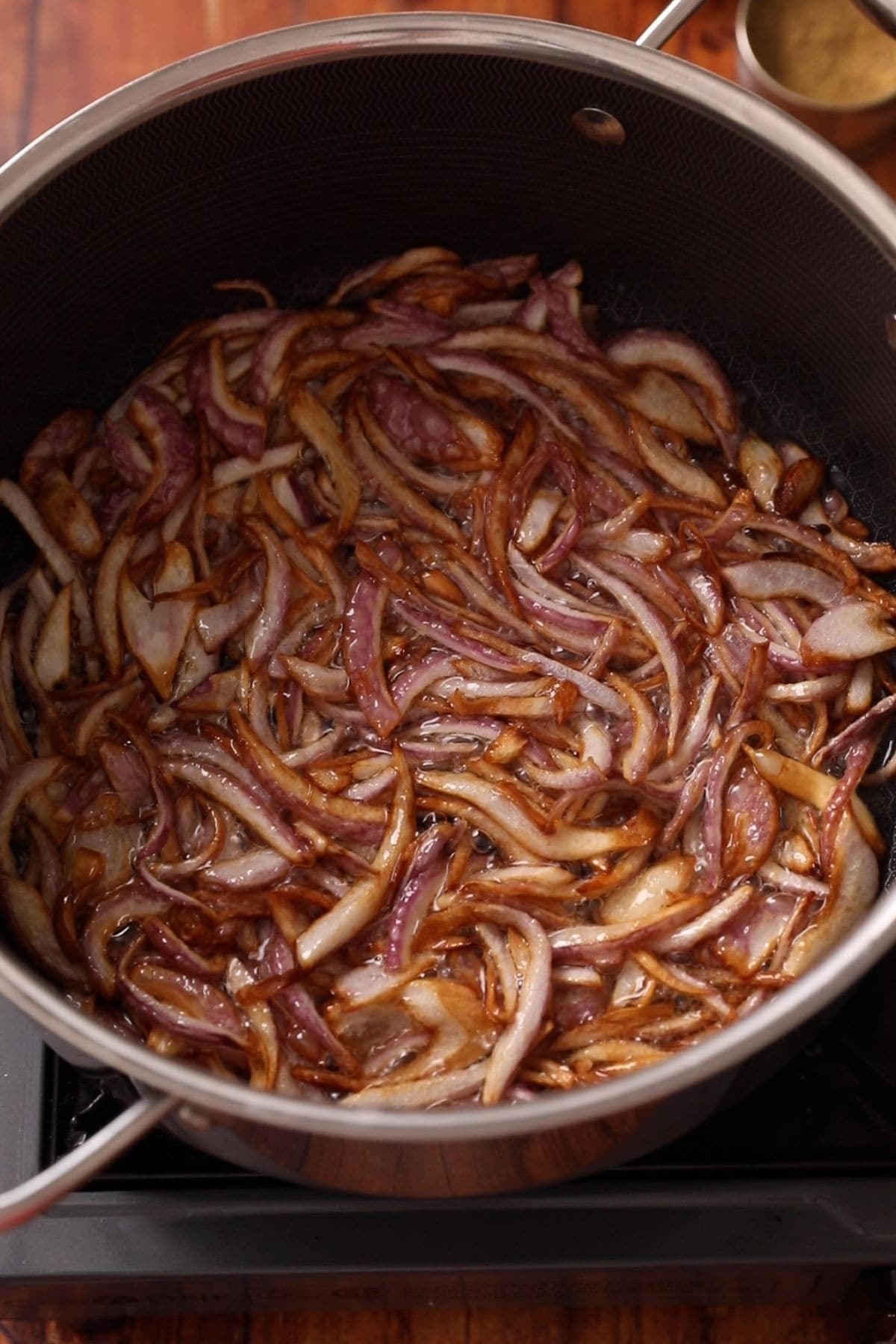 Onions are fried to golden brown in hot oil. 