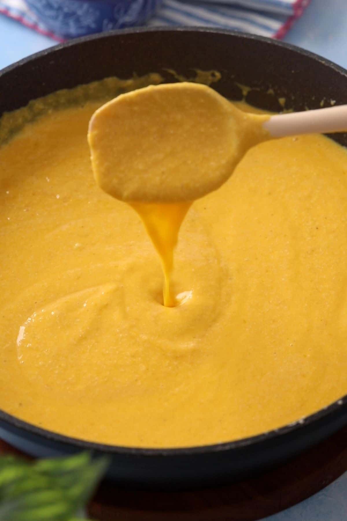 Yellow colored mango kulfi mixture is ready.