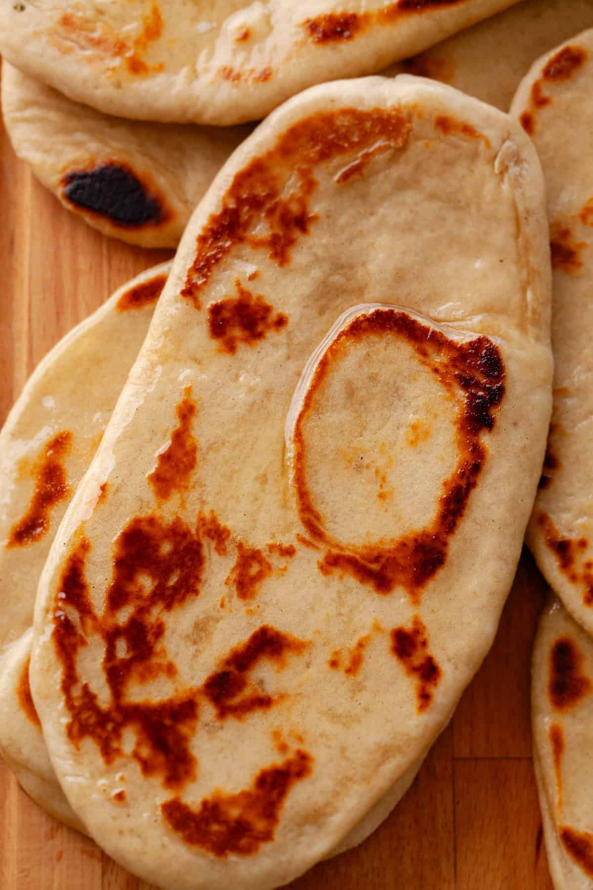 Closeup of buttered whole wheat naan.