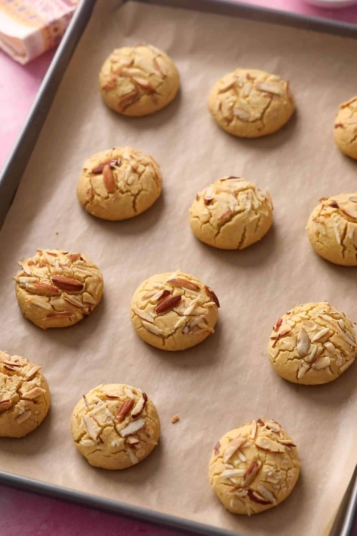 Baked nankhatai on a sheet.