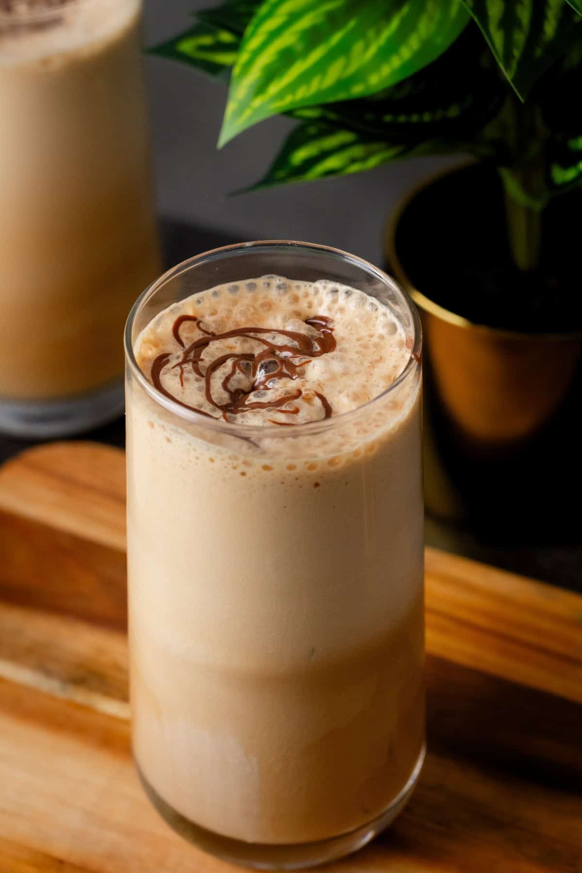 Two glasses of frothy cold coffee.