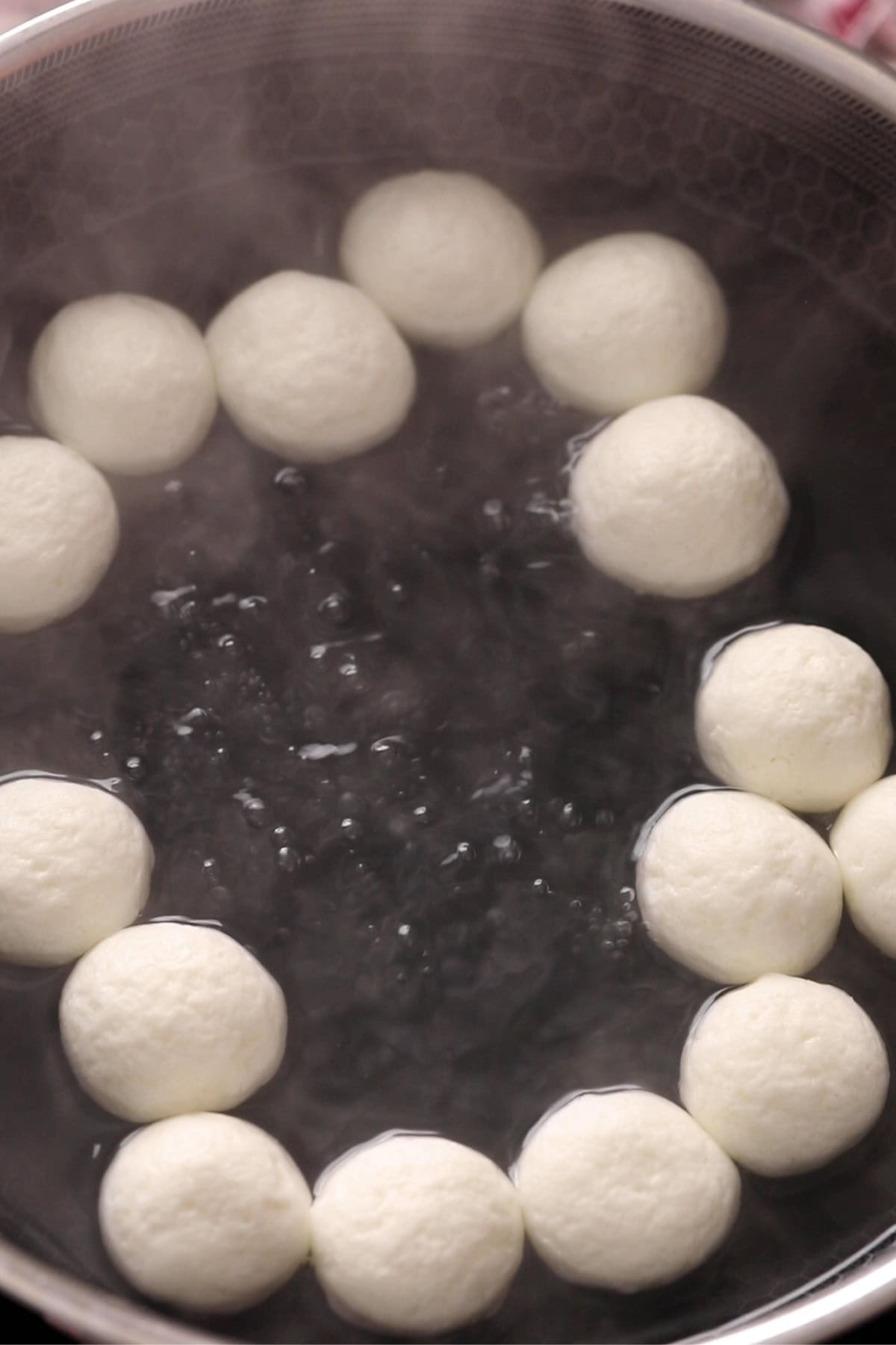 Rasgulla are cooked and doubled in volume.